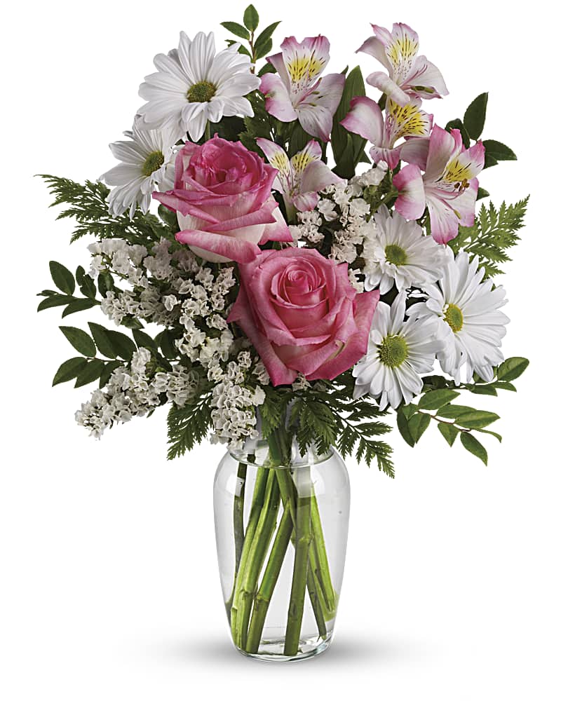 A sweet mix of assorted pink and white flowers.  Vase and/or flower variety will vary depending on seasonal availability. Arrangement will be as close as possible, but may not be exact. 